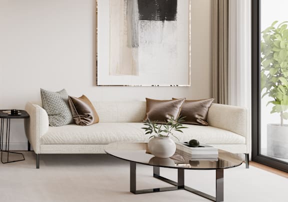 a living room with a sofa and coffee table at Pradera Apartments, San Ramon, California