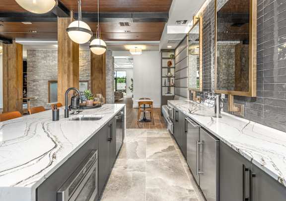A Large Kitchen with Two Sinks at The Haven at Lake Britt Apartments, Winter Garden