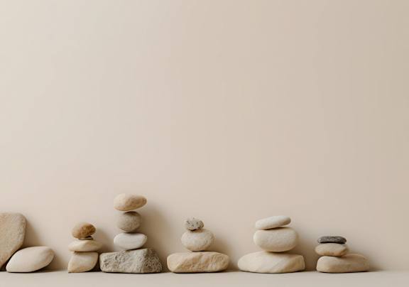 A series of stones are stacked in a line.