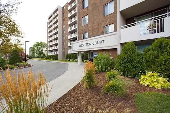 an exterior view of the exterior of extinction court apartments