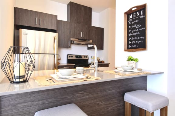 a kitchen with a counter top and a sink