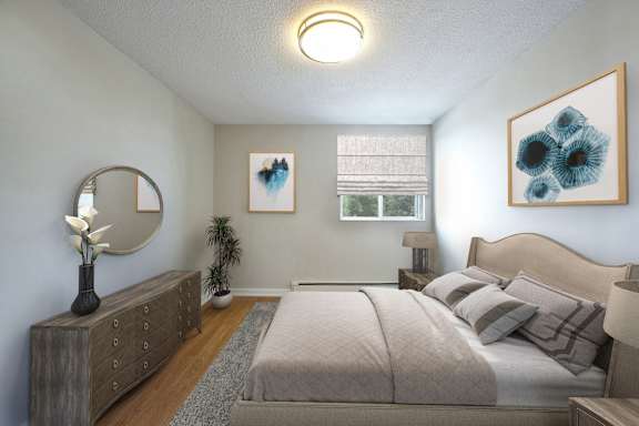 A bedroom with a large bed and a wooden dresser.