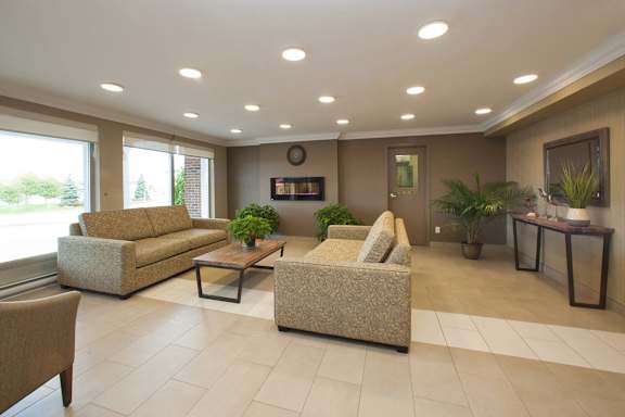 a living room with couches and a table