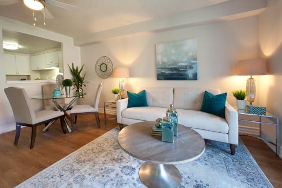 a living room with a couch and a table
