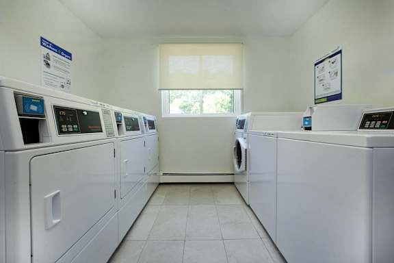 the laundry room is equipped with washes and dryers