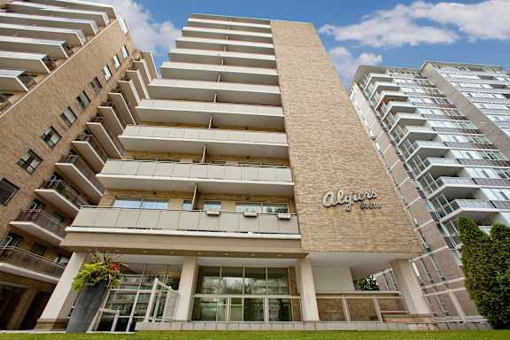 an image of the front of an apartment building