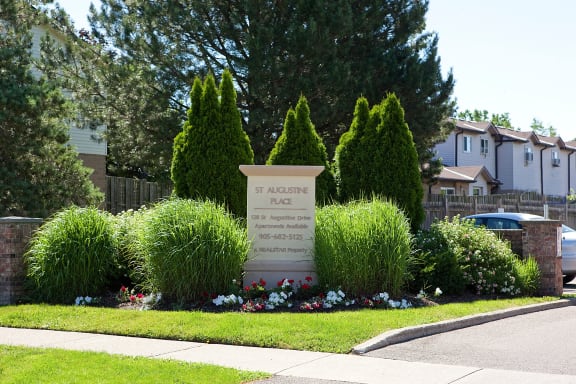 a war memorial in the front yard of a house