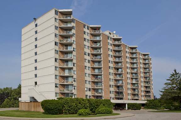 an image of an apartment building on a sunny day