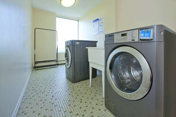 a laundry room with a washing machine and a dryer