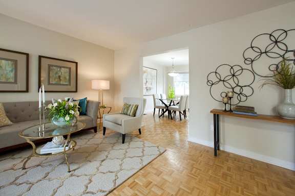 a living room with a couch and a table