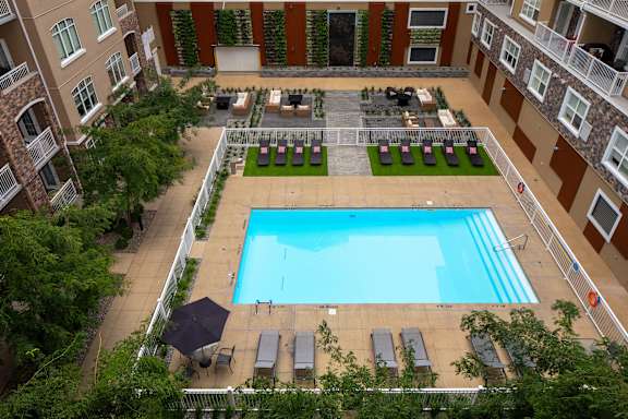 a view of the pool from above at the residences at city center apartments