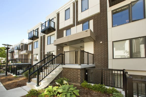 a view of a building with stairs in front of it