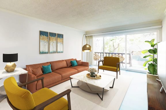 a living room with a brown couch and yellow chairs