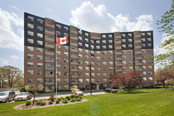 A large building with a Canadian flag on it.