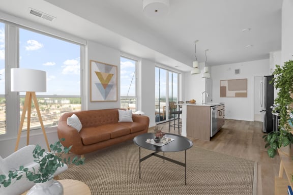 a living room with a couch and a table