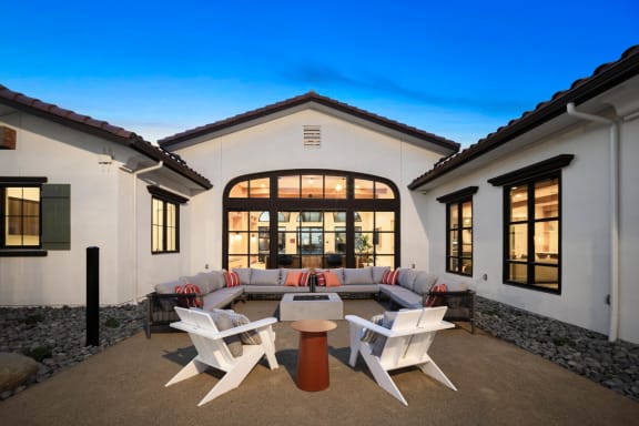 a living room with a couch and chairs in front of a house at Anacapa Canyon, Camarillo, 93012