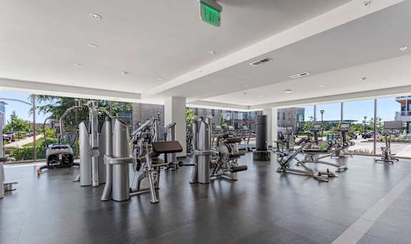 a gym with a view of the city