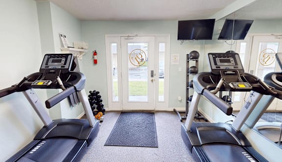 fitness center at apartment complex