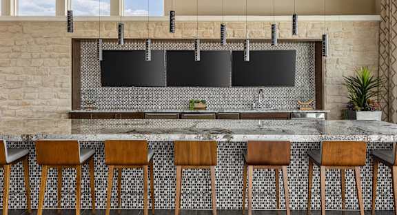 Gateway Arvada Ridge Kitchen Clubhouse Modern Clubroom with Flatscreen TV, Full Kitchen & Coffee Bar