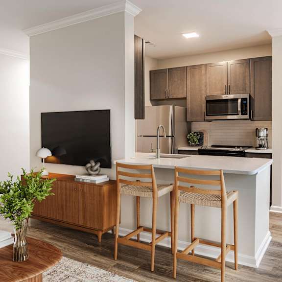 a kitchen with a counter top and a microwave