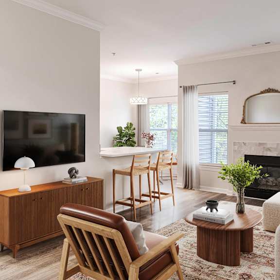 a bedroom with white walls and a window and wood floors