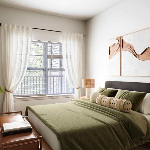 a bedroom with a bed and a ceiling fan
