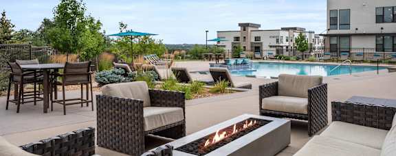 Gateway Arvada Ridge Outdoor Courtyard with Pool, Fireplace, and Seating Areas