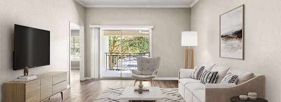A modern living room with a flat screen TV, a white sofa, and a coffee table.