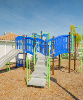 Playground with two slides at trillium luxury apartments in melbourne fl