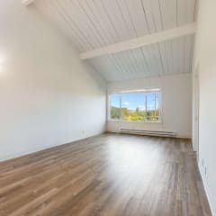 living room with vaulted ceiling