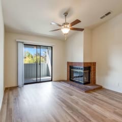 living room with fireplace and sliding glass door at Vintage Pointe Apartments, California, 94928