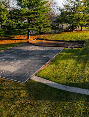 our apartments have a pool and lounge chairs around it at Rosemont Place Apartments, Des Moines, IA, 50320