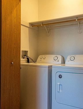 a laundry room with a washer and dryer in it at Sunrise Meadows, Waukee, IA, 50263