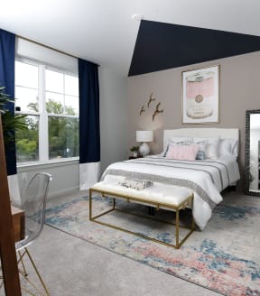 a bedroom with a large window at Heights at Glen Mills, Glen Mills, PA