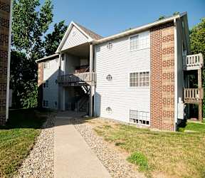 A two-story apartment building with a balcony on the second floor. at Saylorville Lakeside, Polk City, 50226