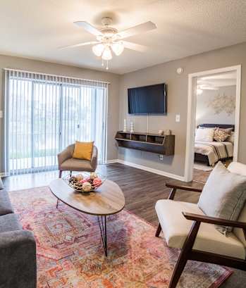 a living room with a couch and a table