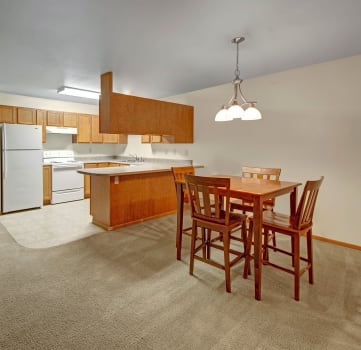 Kitchen and Dining Room at Dakota Apartments. Apartments for rent in Stanley, ND