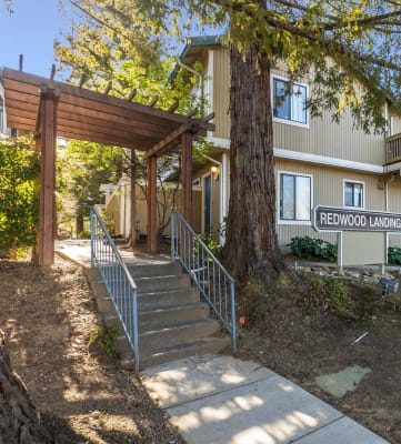 exterior of apartment building with Redwood Landing sign