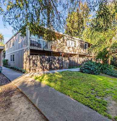 exterior of apartments with landscaping at Walnut Grove Apartments, Novato, CA, 94947