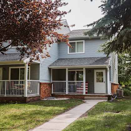 Grand Forks, ND Bristol Park Apartments.a house with a walkway in front of it