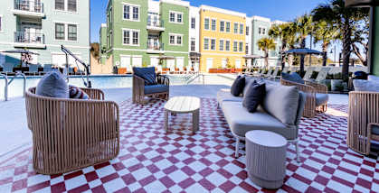 Poolside Patio Area at The Merchant Apartments in Charleston, SC 29403