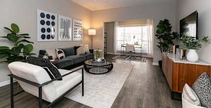 an open living room with a ceiling fan and at Willowest in Collier Hills in Atlanta, Georgia