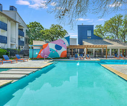 Sparkling turquoise pool at Peaks @ NW Hills Apartments, Texas