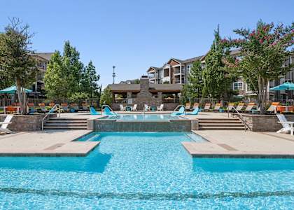 Outdoor pool at Atley on the Greenway Apartments in Ashburn VA