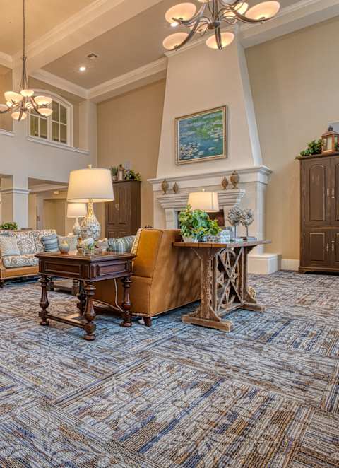 a living room with furniture and a piano at Mariposa at South Broadway, Joshua, 76058