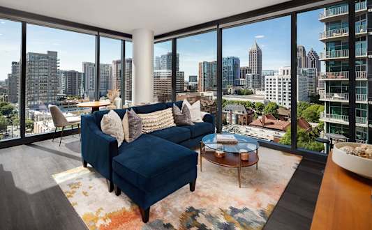 Living room area with view and couch at 903 Peachtree in Atlanta, Georgia