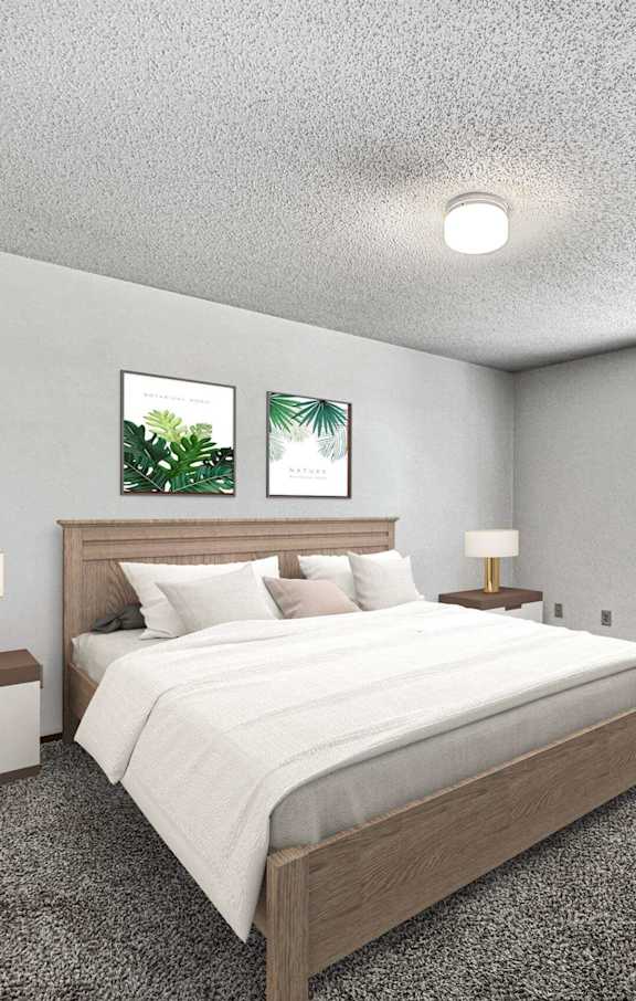 A bedroom with a large bed and a window.at Autumn Park, Sioux Falls, 57106