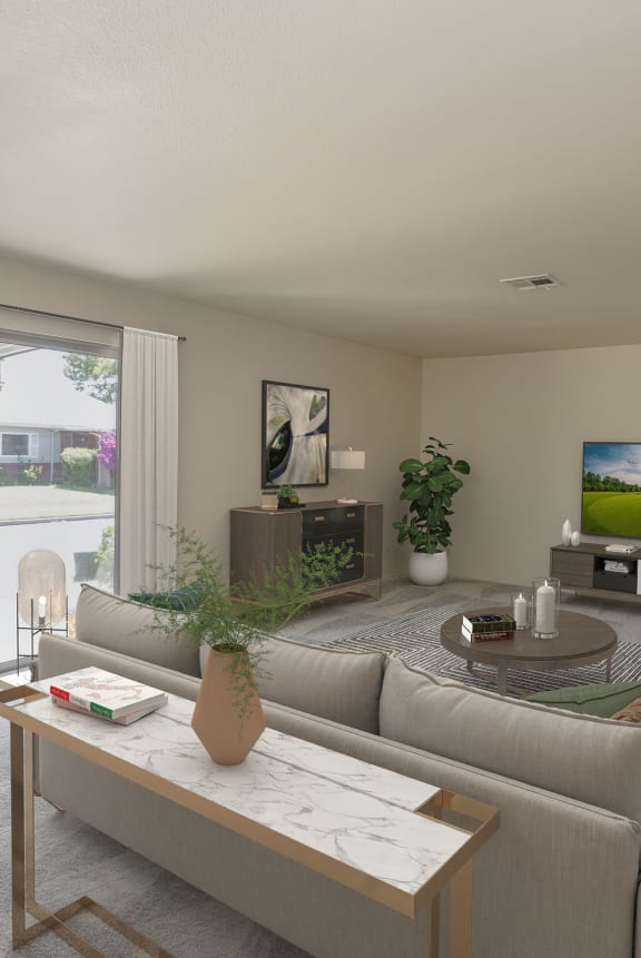 a living room with white couches and a coffee table  at Castle Vista Senior Duplex Community, Atwater, CA