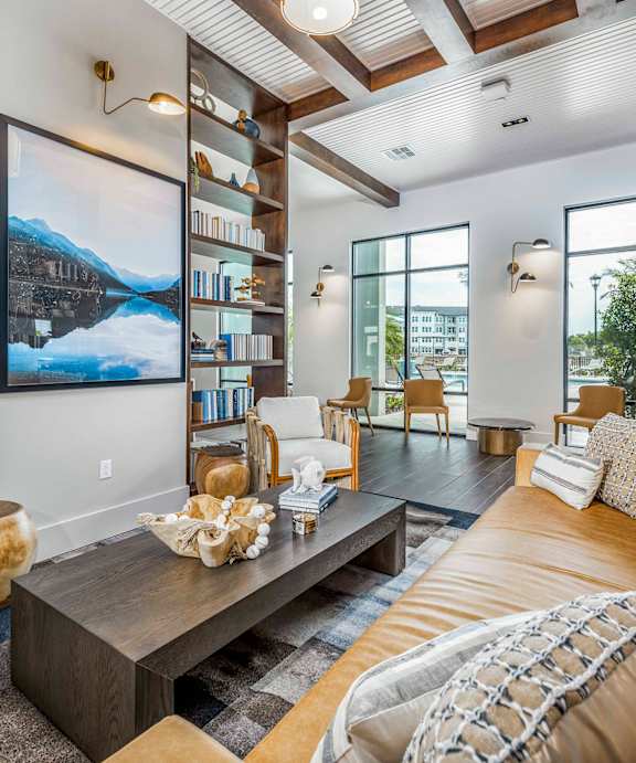 A dining room with a table set for four at Stillwater Lakes Apartments, Kissimmee, FL