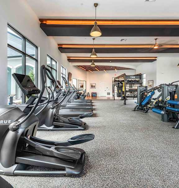 A gym at Stillwater Lakes Apartments, Kissimmee, FL